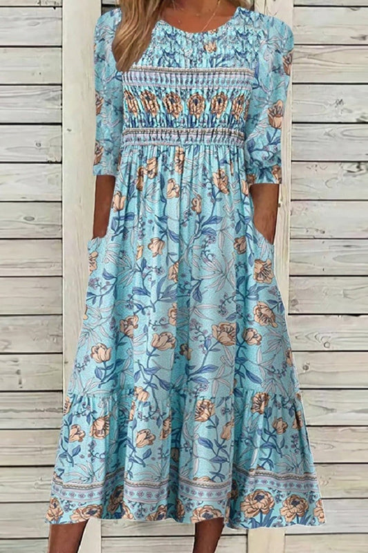 Darcie | Zwiewna sukienka w płatki, elegancko tuszująca brzuch