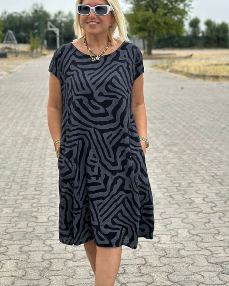 Nelia | Letnia sukienka z okrągłym dekoltem i ładnym nadrukiem