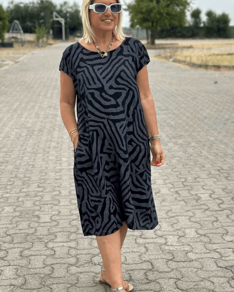 Nelia | Letnia sukienka z okrągłym dekoltem i ładnym nadrukiem
